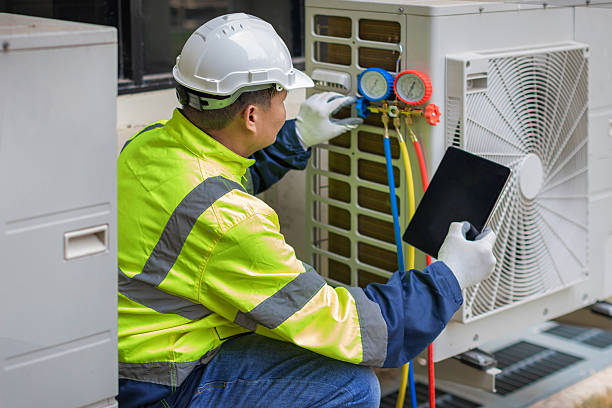 Professional Hvac technician working in Olmstead, KY